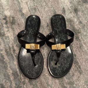 Salvatore Ferragamo Black Sandals with Gold Detail